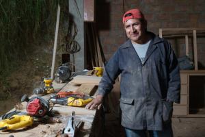 Photo by Peter Caton/Lendwithcare of José Elías Maza a carpenter in Ecuador 